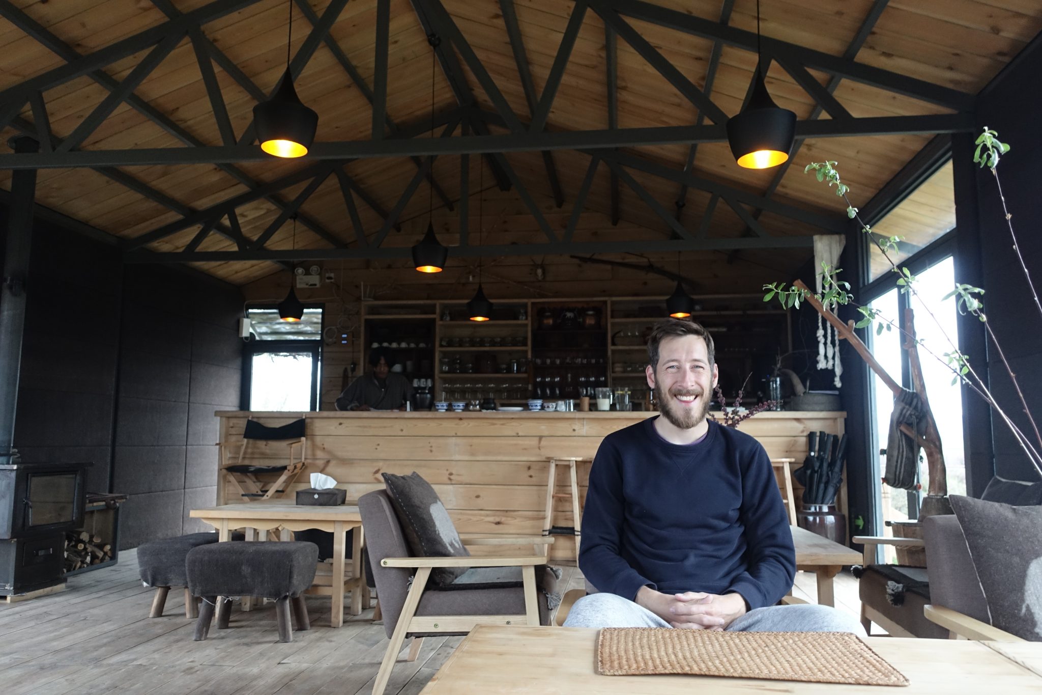 Scott Mallinson, web designer, developer and digital specialist, sat in a restaurant in Gansu province